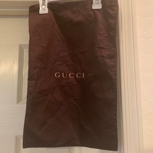 Brown GUCCI dust bag. Made in Italy